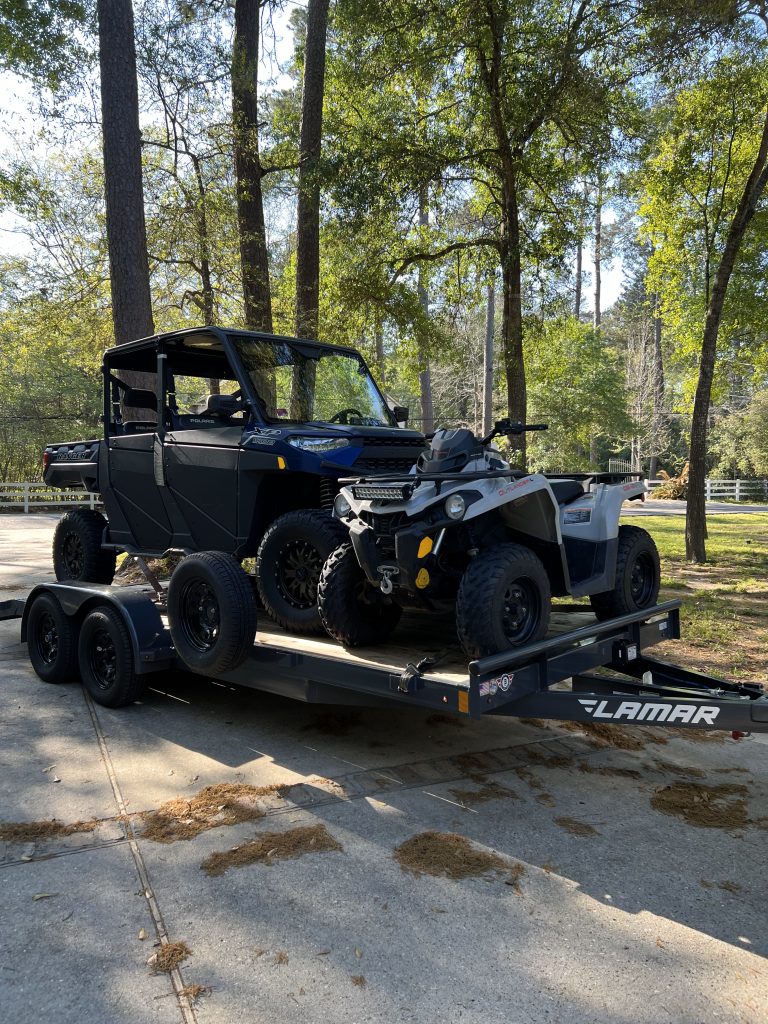 side by side and four wheeler on trailer rental from Alpha One Trailer in Tomball, TX